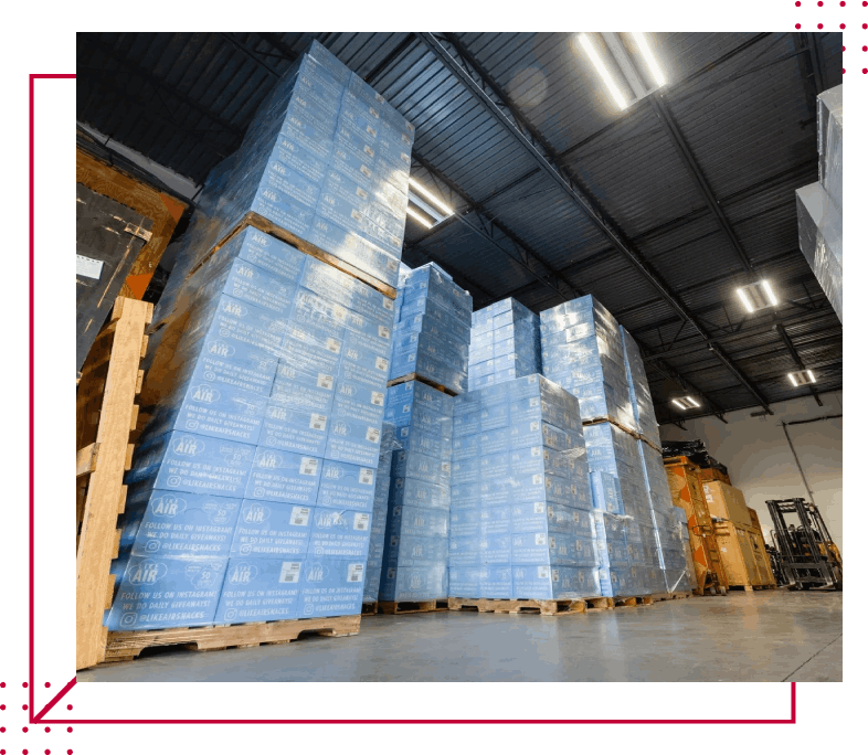 A warehouse filled with boxes of blue paper.